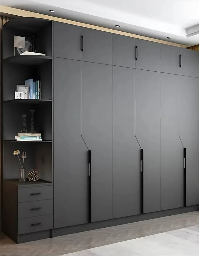 Floor-to-ceiling wardrobe with matte laminate shutters and integrated shelving