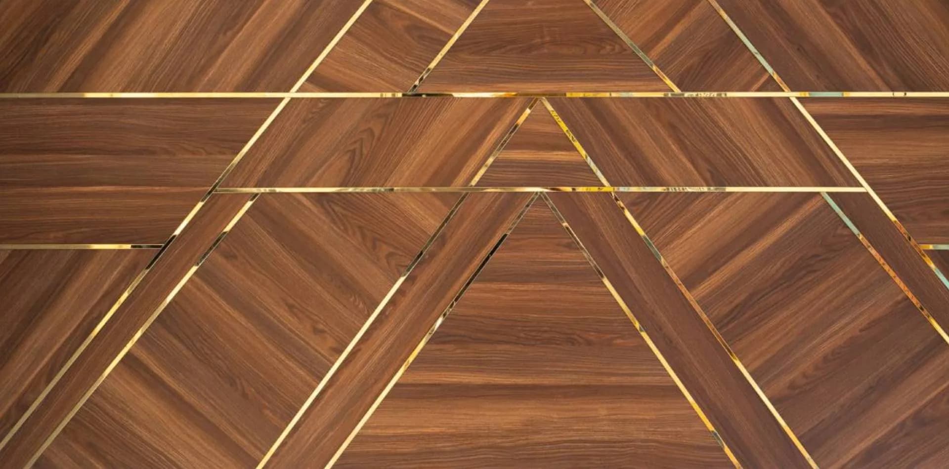 Wood door with geometric brass inlay lines