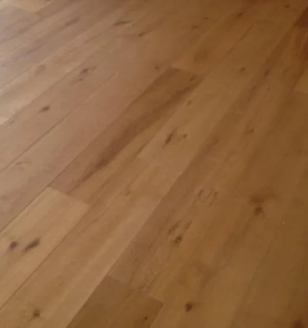 Honey-orange wood-look planks seen at an angle