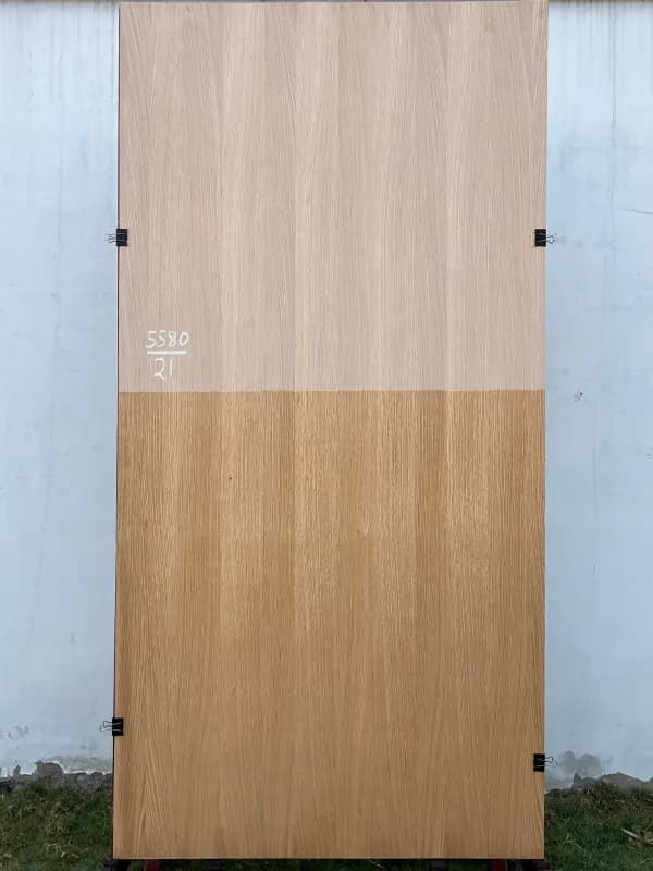 White oak wood veneer sheet, shown half raw and half finished