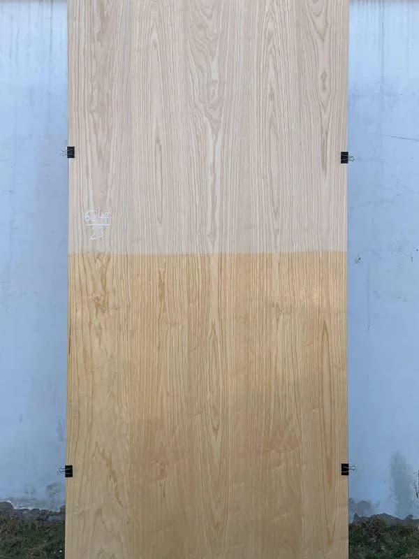 White ash veneer sheet with a raw upper half and a finished lower half