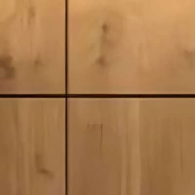 Close-up of oak veneer wardrobe shutters with a thin groove between them
