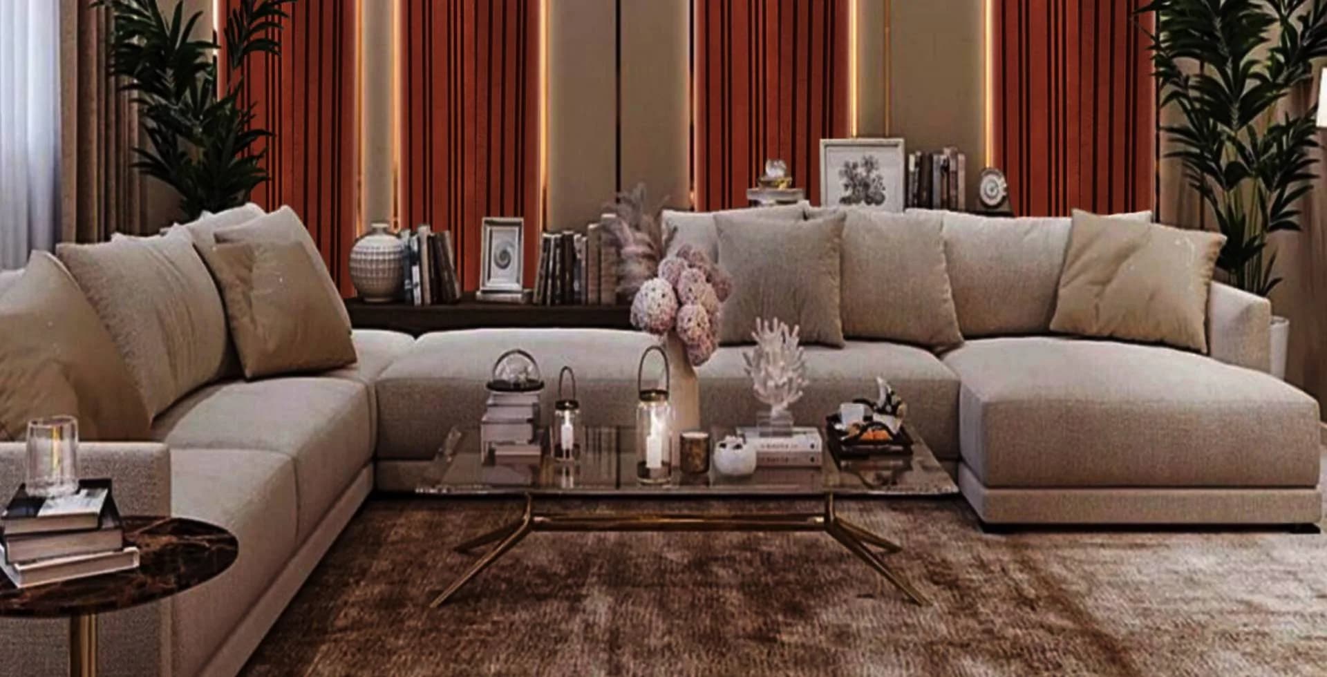 Living room with a beige sectional sofa, red curtains and a large brown rug