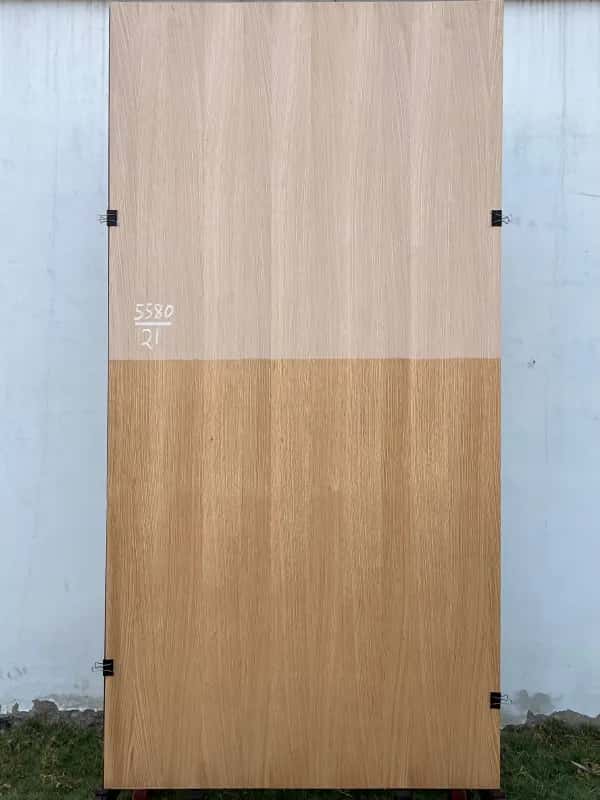 Second white oak veneer sheet, raw upper half and finished tan lower half