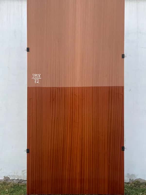 Second Sapeli veneer sheet with a raw upper half and a polished red-brown lower half