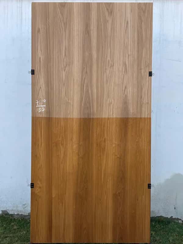 Second teak veneer sheet, raw upper half and finished brown lower half