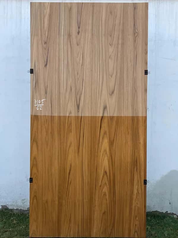 Third teak veneer sheet, raw upper half and finished brown lower half